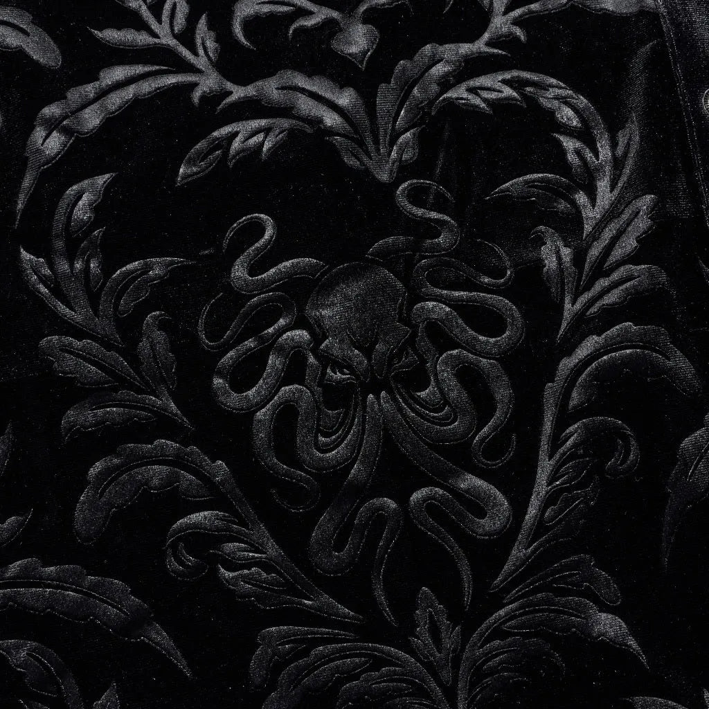 Black men's velvet shirt with pointed collar, long sleeves, and decorative printing and flocking fasteners.