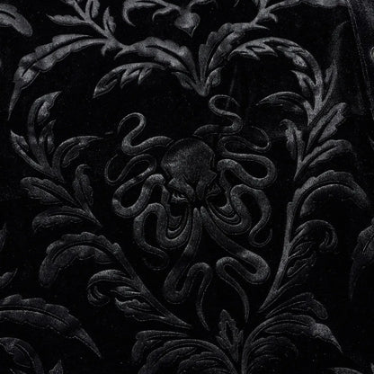 Black men's velvet shirt with pointed collar, long sleeves, and decorative printing and flocking fasteners.