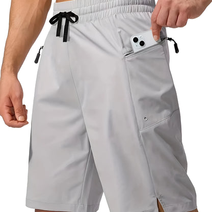 Man wearing solid colour straight-leg beach shorts in quick-dry polyester fabric.