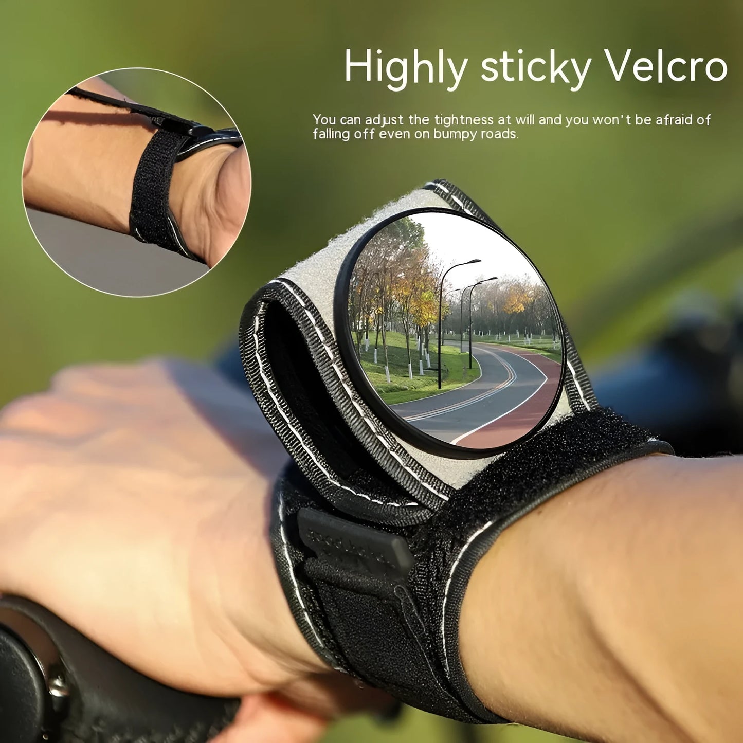 Black nylon bicycle rear-view mirror mounted on a cyclist's wrist.