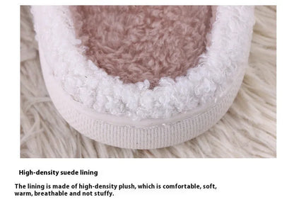 White fluffy cartoon-pattern slippers with a rubber sole and artificial wool lining.