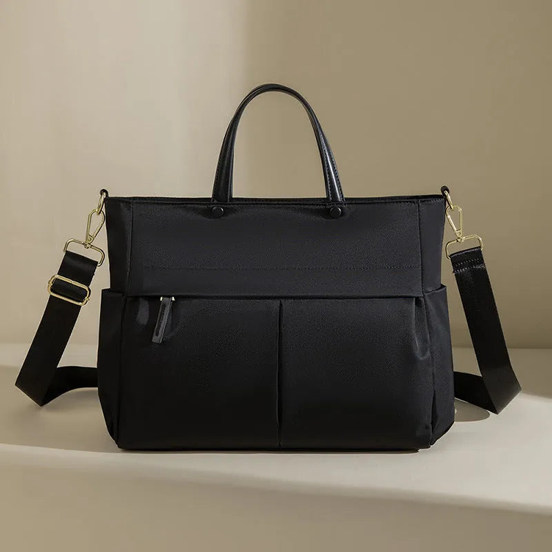 Women's portable Oxford cloth briefcase with 36cm length and contrast stitching in black colour