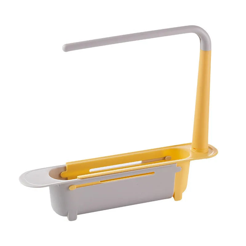 Telescopic plastic kitchen sink drain rack with multi-coloured modular baskets.