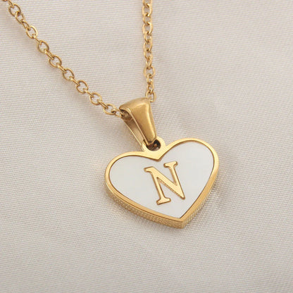 Personalized heart-shaped white shell necklace with adjustable clavicle chain, a stylish and versatile jewelry piece for women