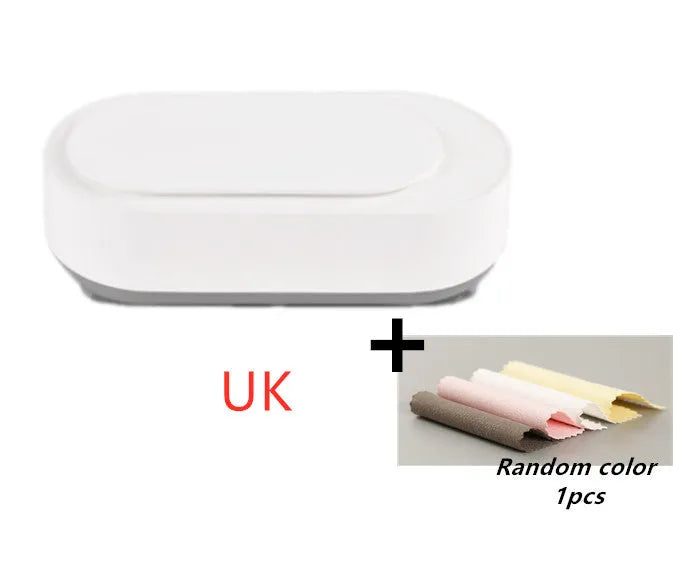 White portable ultrasonic cleaner with stainless steel tank for cleaning jewellery and glasses.