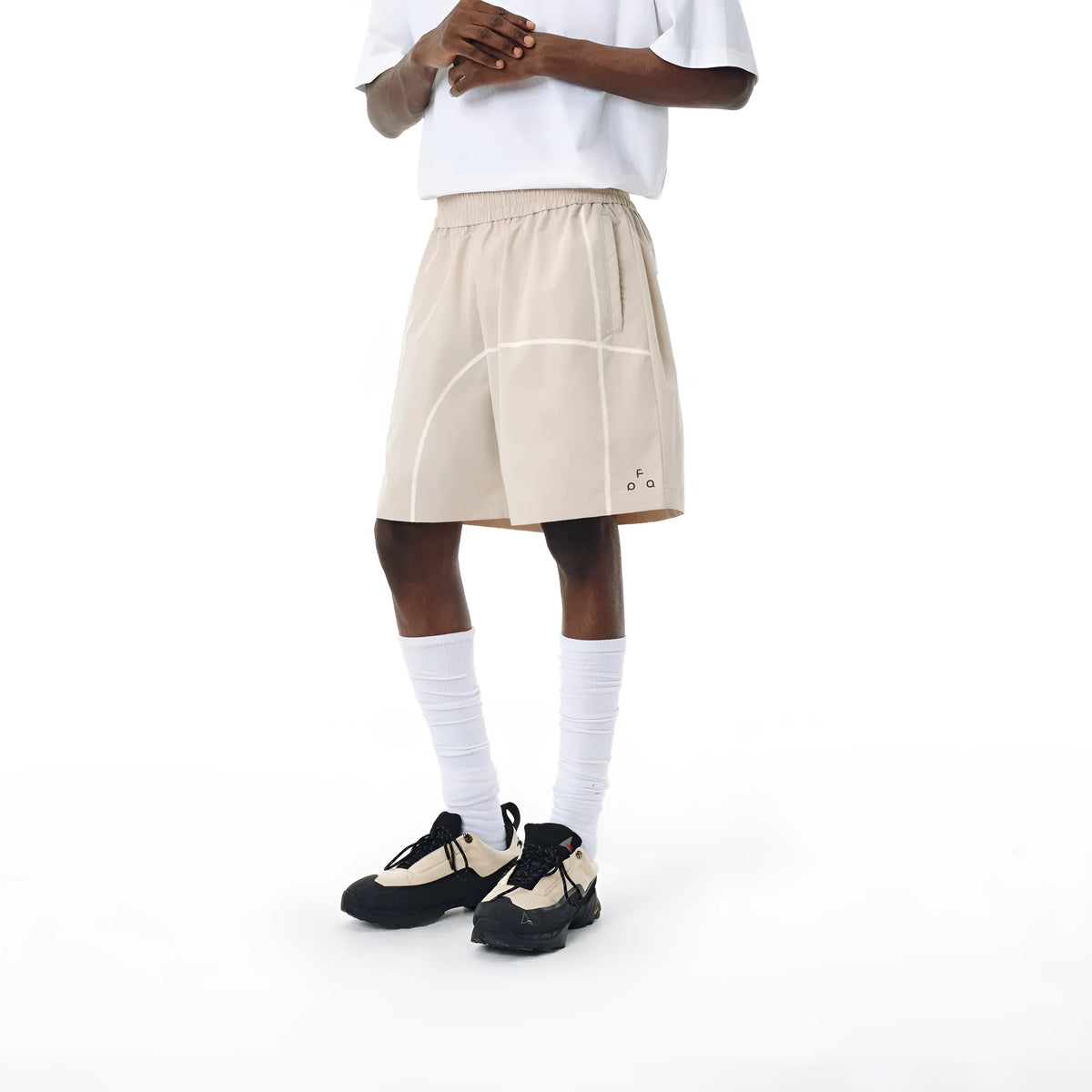 Men's dark grey loose fit drawstring shorts made from high elasticity polyester fabric.