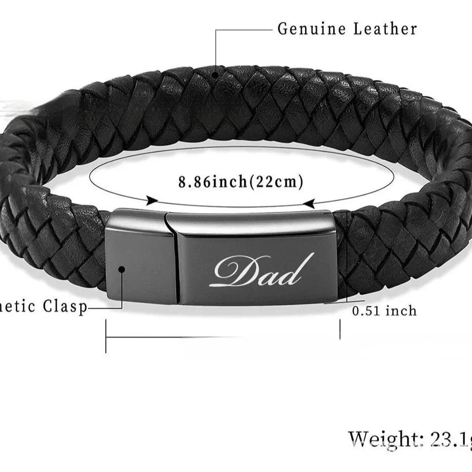 Black leather and stainless steel cinerary bracelet with personalised English letters, presented in a gift box.