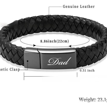 Black leather and stainless steel cinerary bracelet with personalised English letters, presented in a gift box.