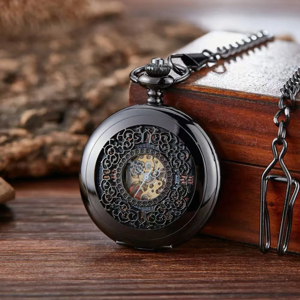 Retro mechanical pocket watch with floral print dial and transparent case back showing movement