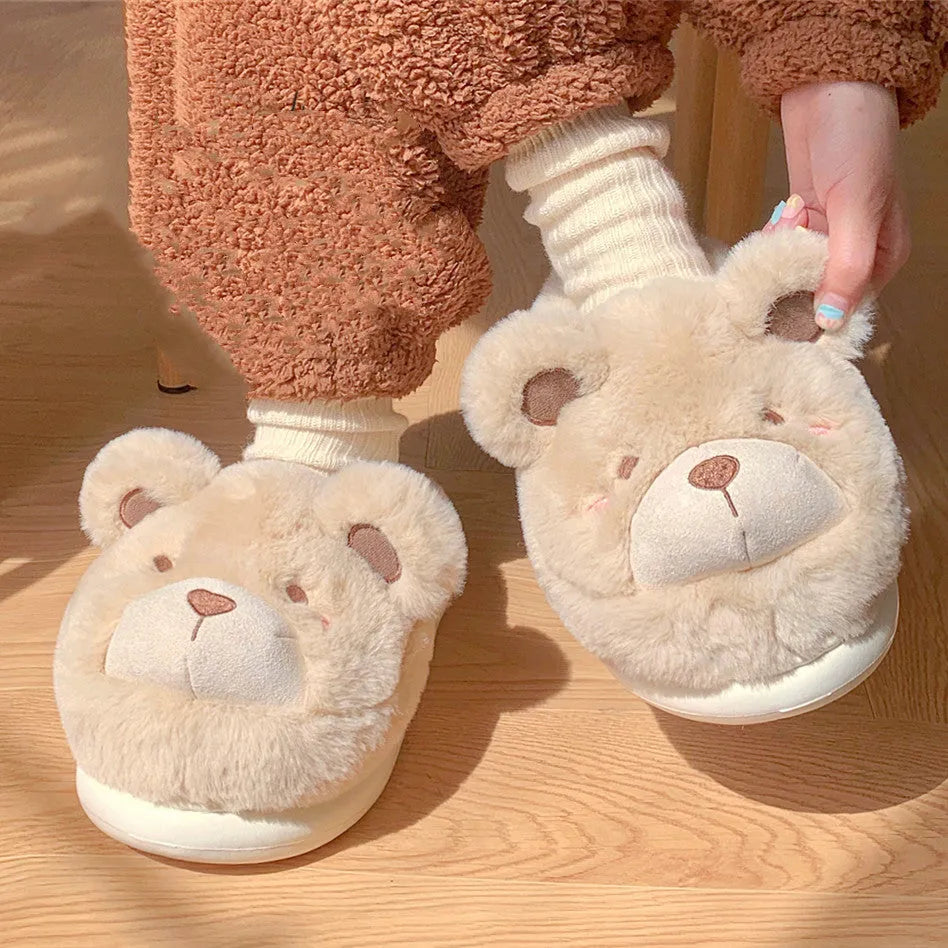 Women's cartoon-patterned suede plush slippers in milky white, shown with a rounded toe.