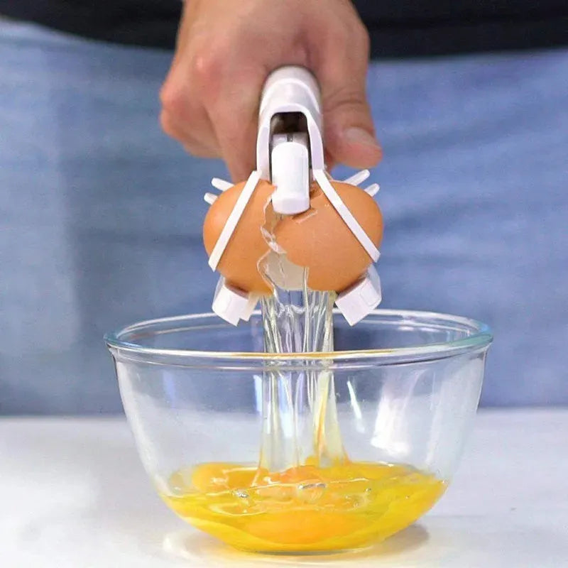 White handheld egg cracker and separator kitchen tool with curved plastic design