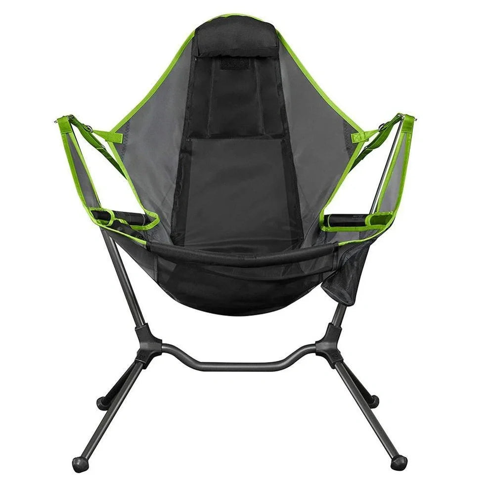 Green folding rocking chair unfolded on beach, 85cm tall with 60cm seat supporting 120kg