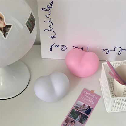 White and pink vinyl atmosphere lamps in trumpet and tuba shapes showing 8cm and 11cm size options