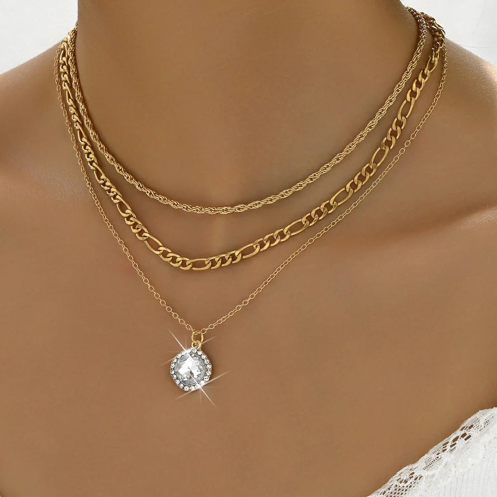 Gold multi-layer pendant necklace with geometric design and hemp flowers chain texture