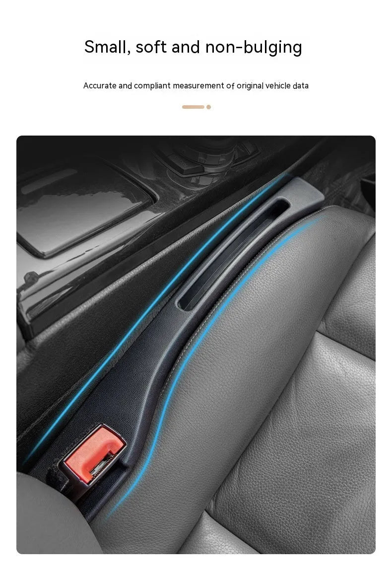 Black car seat gap storage box organiser with compartments and carrying handle between vehicle seats