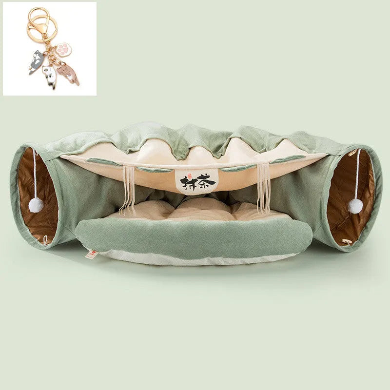 Collapsible cloth cat tunnel in pink colour, shown in both open and folded positions.