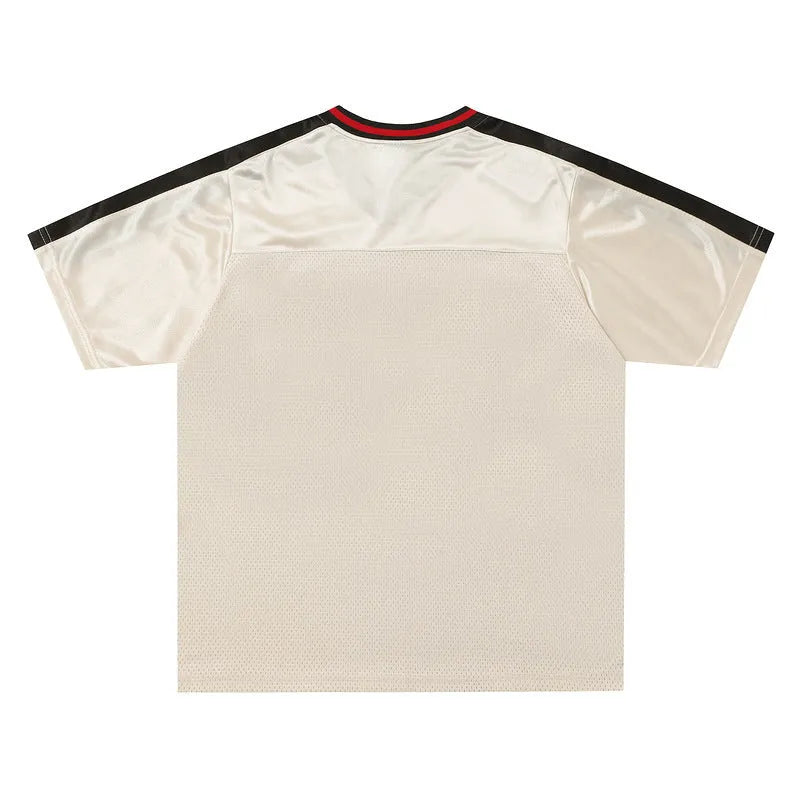 Apricot colour sports V-neck jersey top with drop-shoulder sleeves and letter pattern detail
