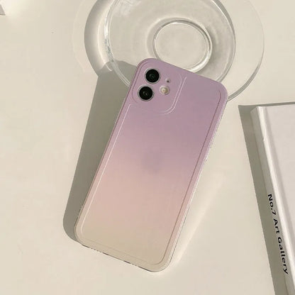 Yellow and purple gradient silicone iPhone case showing integrated airbag X bracket on the back.