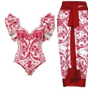 Women's printed one-piece swimsuit in rose pink on a mannequin.
