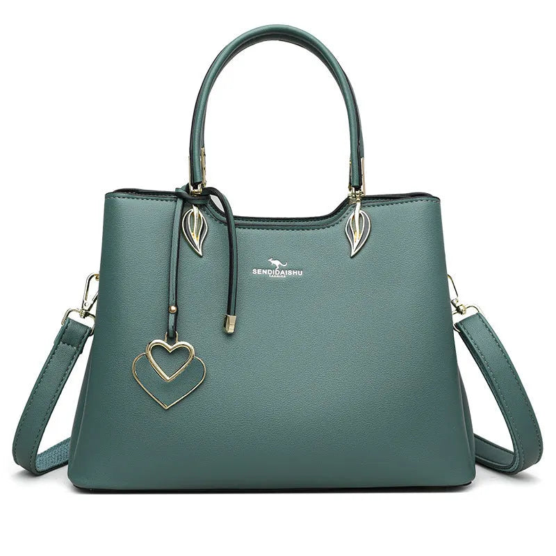 Black women's multi-layer PU leather shoulder messenger bag with sewing thread detail.