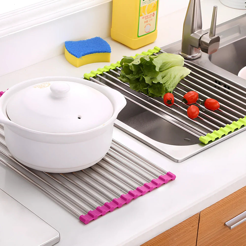 Stainless steel sink drain rack with rolling curtain design folded to show compact 5cm storage thickness