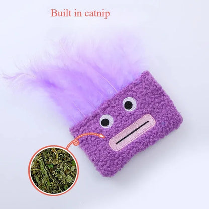 Colourful plush cat toy shaped like an explosion head with a large open mouth, shown in blue.