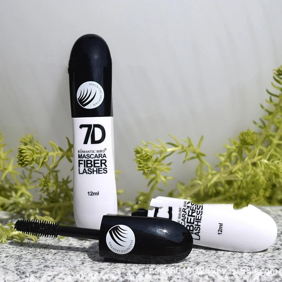 Black 7D mascara tube with brush showing separated lashes in waterproof formula