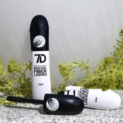Black 7D mascara tube with brush showing separated lashes in waterproof formula