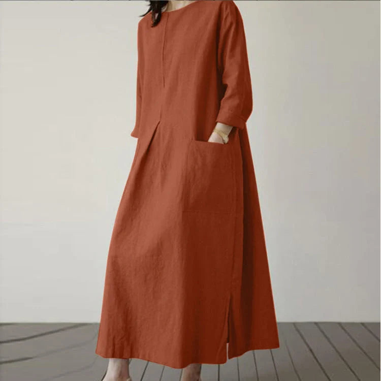 Elegant autumn dress made of premium cotton fabric, with a flattering wide waistline and available in a range of classic autumn colours.