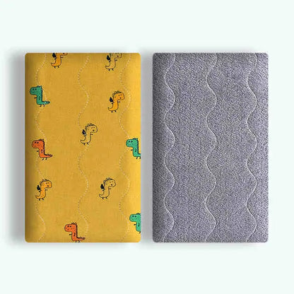 Double-sided cotton wool pet blanket in dinosaur print showing reversible construction