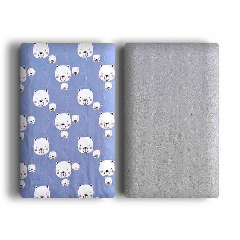 Double-sided cotton wool pet blanket in dinosaur print showing reversible construction