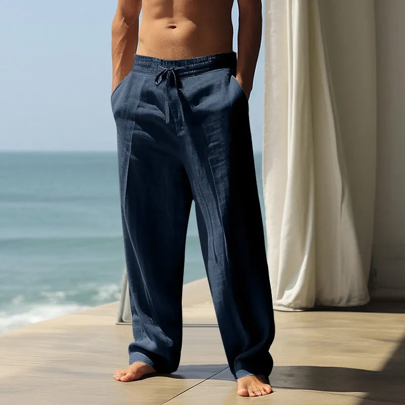 Men's loose-fit casual cotton trousers in khaki colour with an elastic waistband.