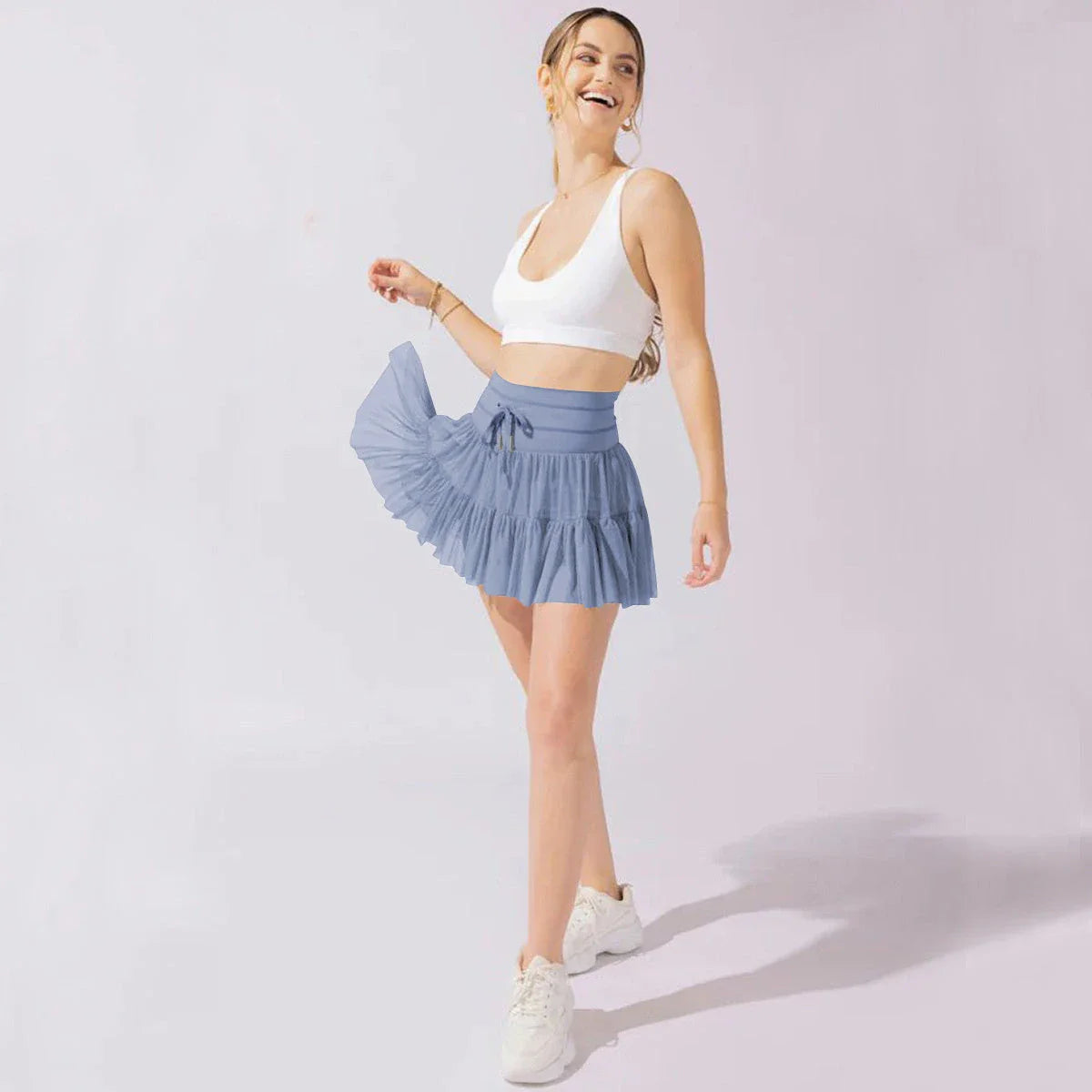 Stylish high-waist pleated skirt with lace-up accents in various colors, including black, gray, blue, apricot, pink, white, and purple