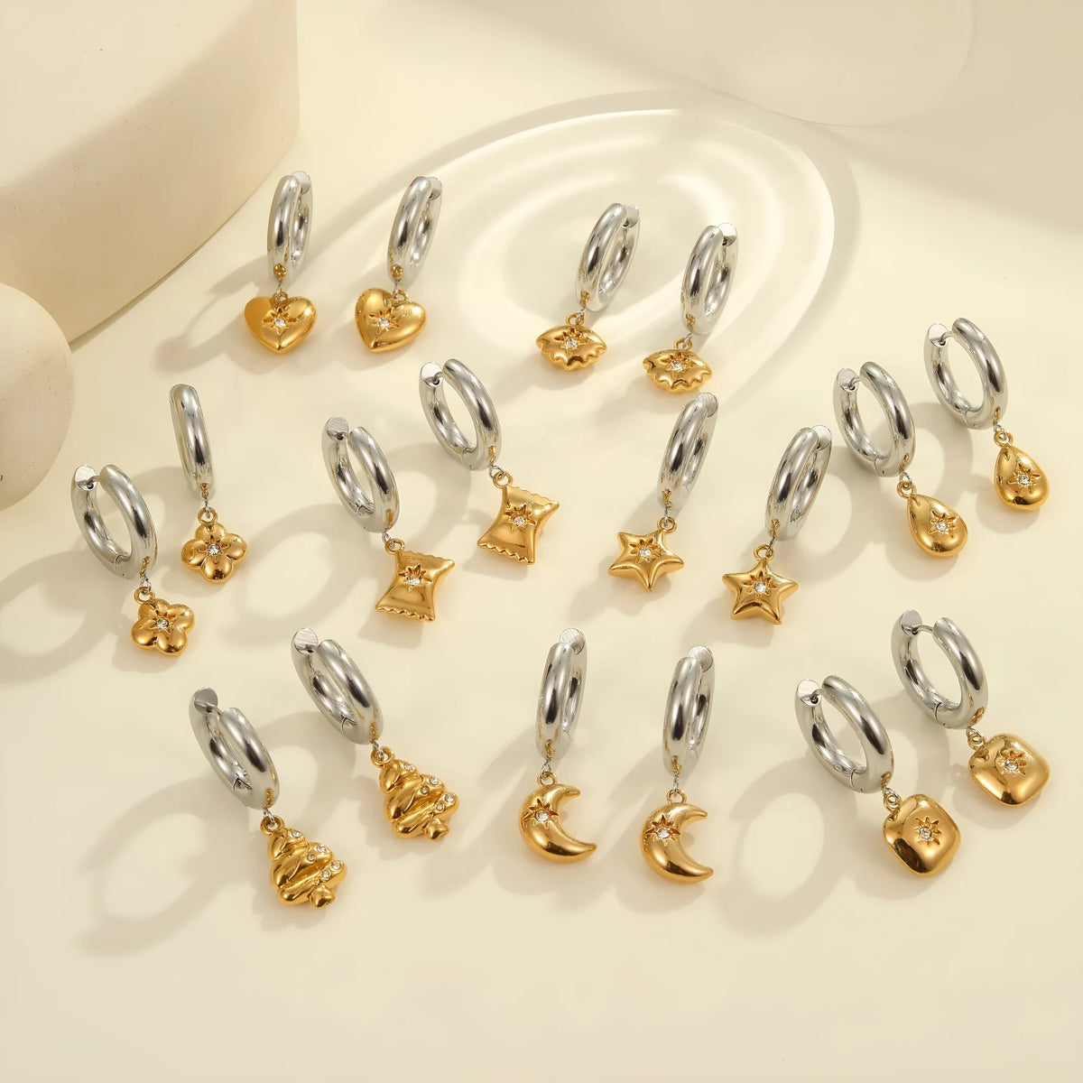 Stainless steel Christmas tree earrings with 18K electroplated finish and heart-shaped star ornament designs
