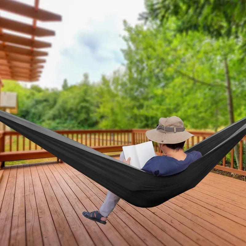 Double camping parachute hammock in colour options including black brown, black red, blue, and orange