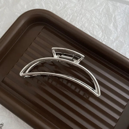 Silver metal hair claw barrette example from a range of 44 Korean-style designs.