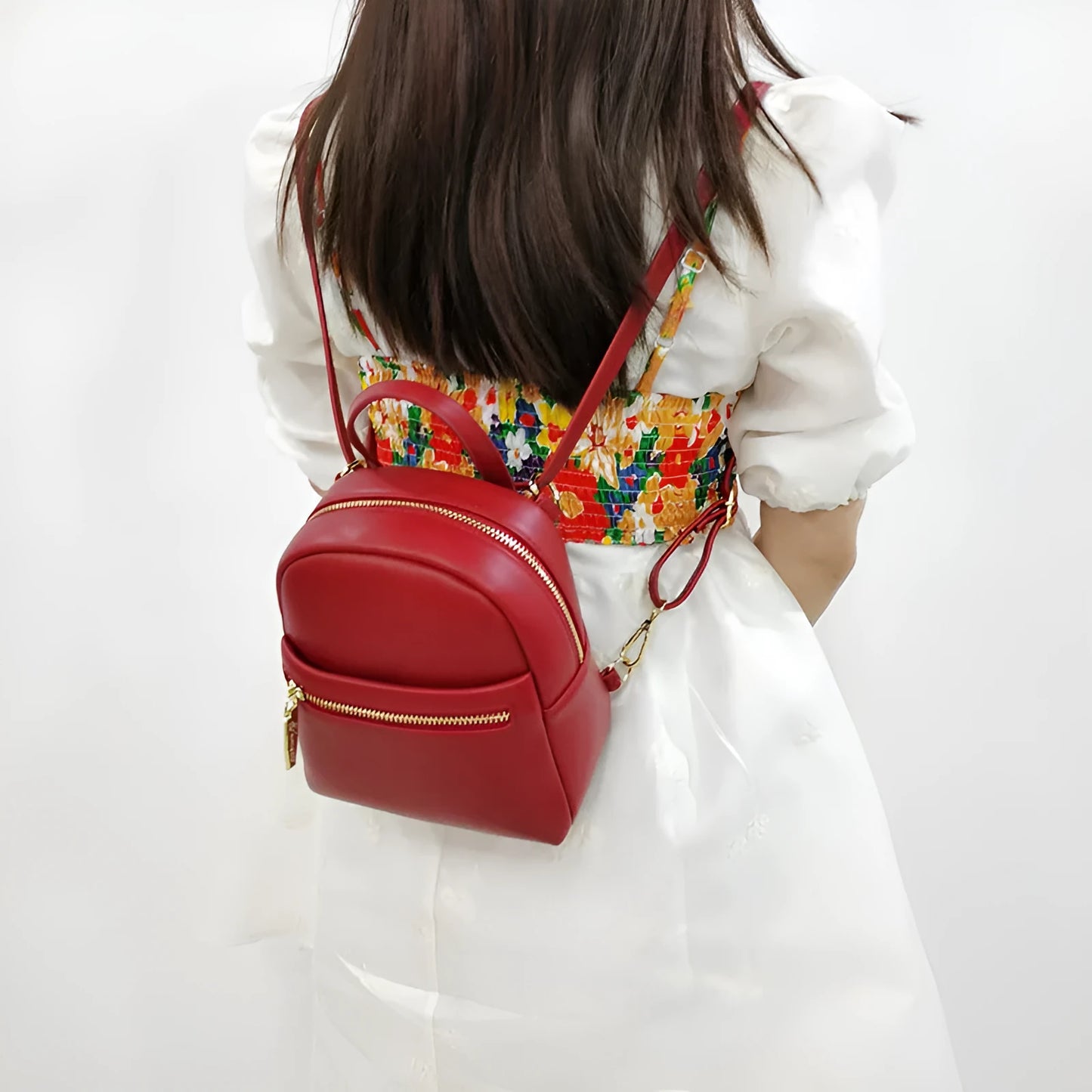 Soft PU mini backpack with three-dimensional pocket showing internal mobile phone bag organisation
