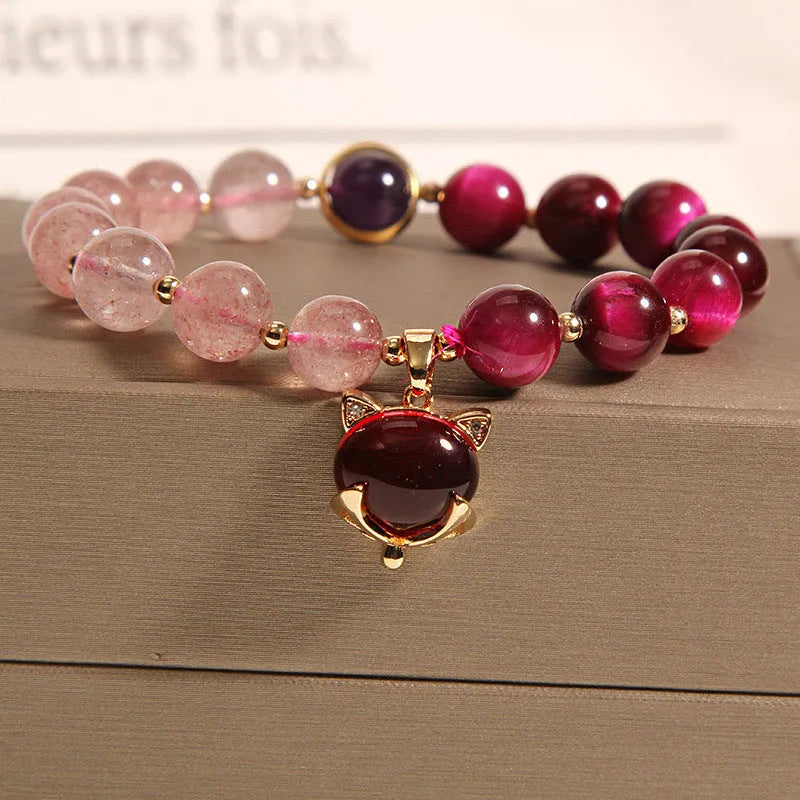 Women's elastic bracelet with strawberry crystal on a stretchy rope band.