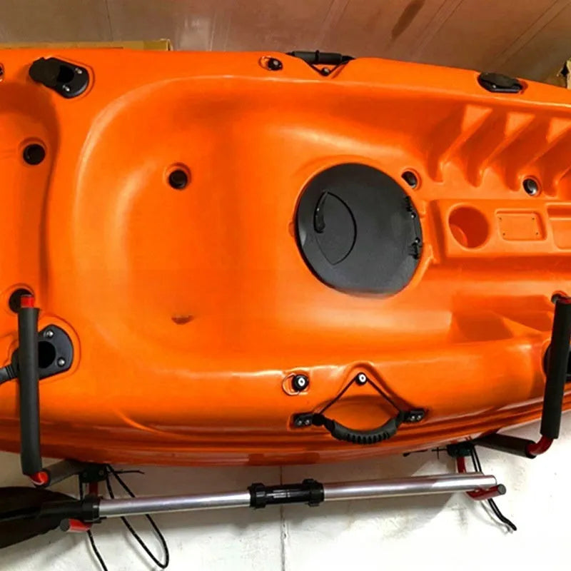 Carbon steel kayak wall hanger rack mounted on a wall for storage.