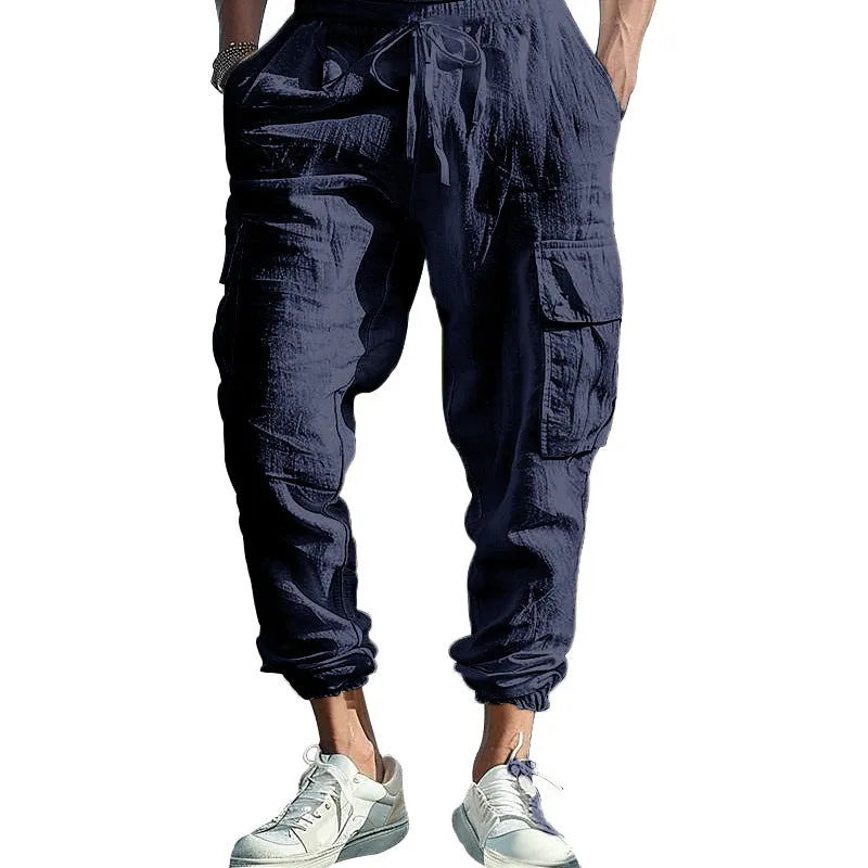 Men's linen casual trousers with adjustable ankle ties and four pockets in khaki colour