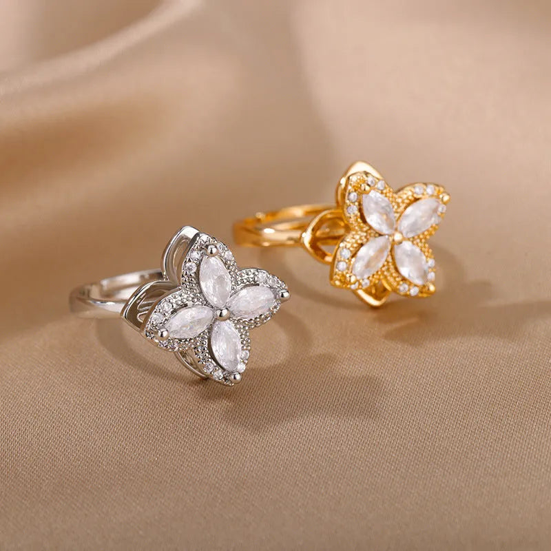 Rotatable copper flower ring with rhinestones, available in gold or platinum finish for women