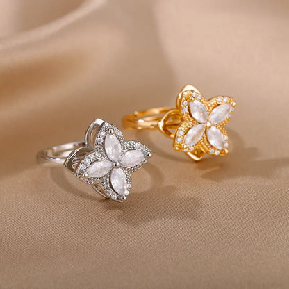 Rotatable copper flower ring with rhinestones, available in gold or platinum finish for women