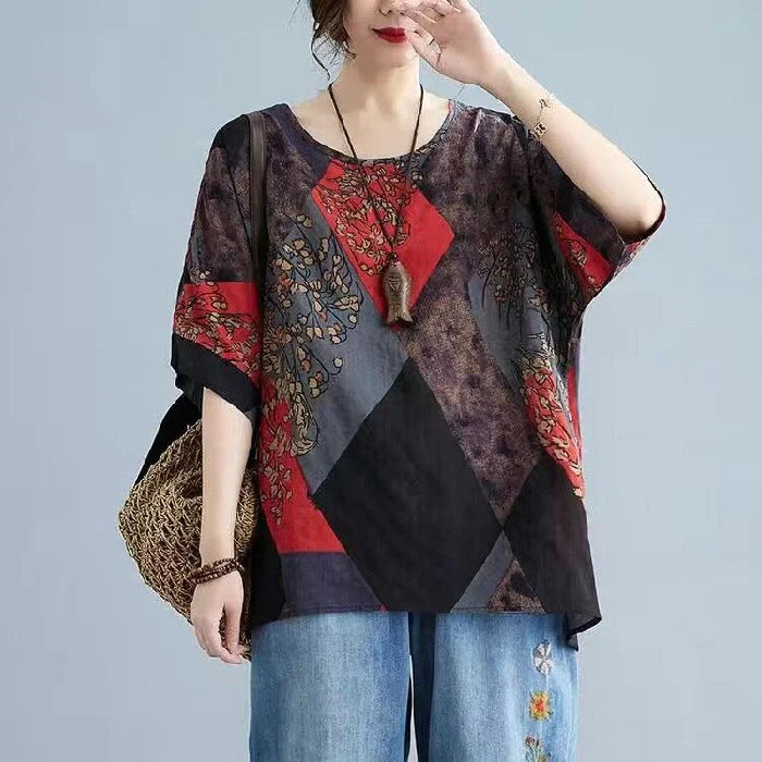 Stylish women's retro-inspired t-shirt in vibrant yellow, red, and brown printed design