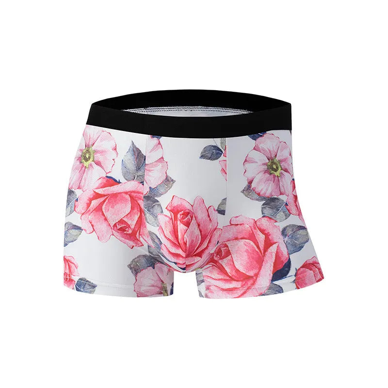 Men's printed ice silk underwear briefs in a floral design, showing mid-waist fit.