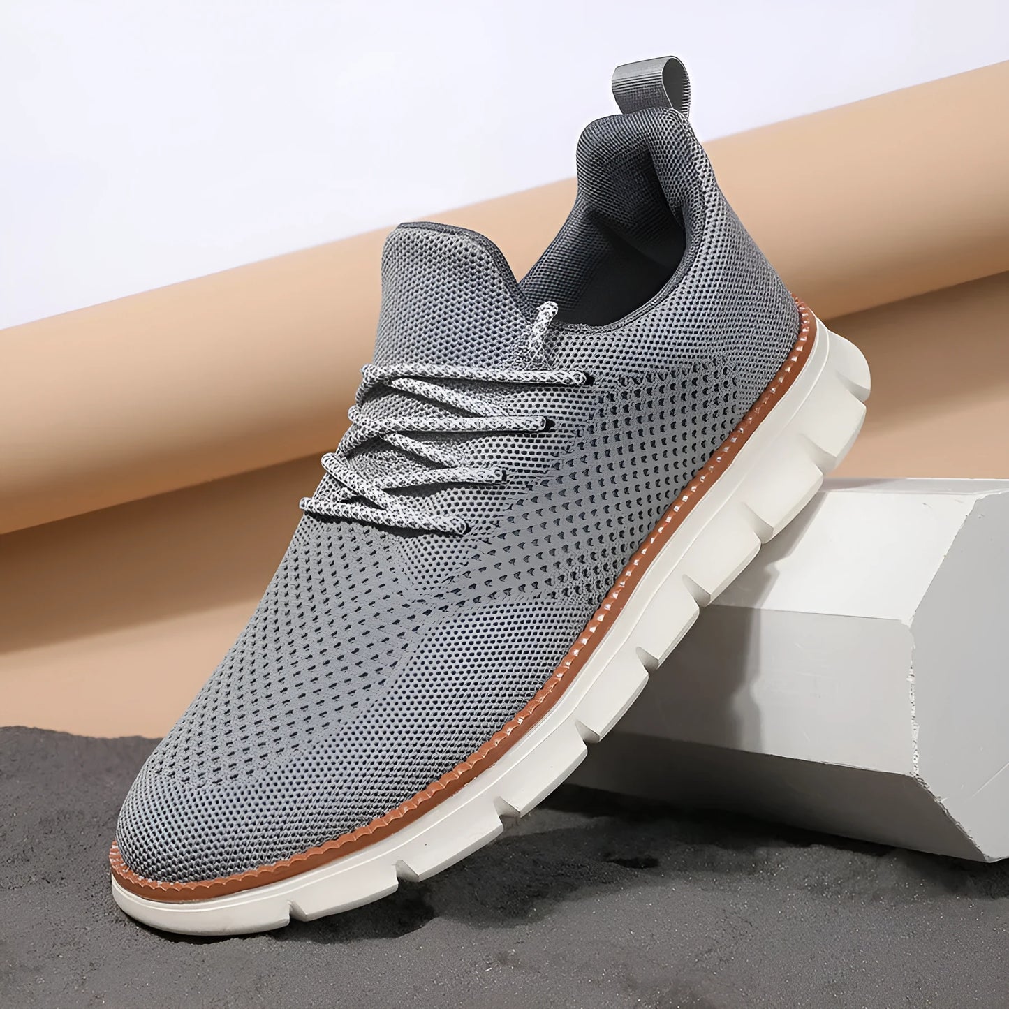 Men's grey and black low-heel casual sneaker with mesh fabric upper and round toe