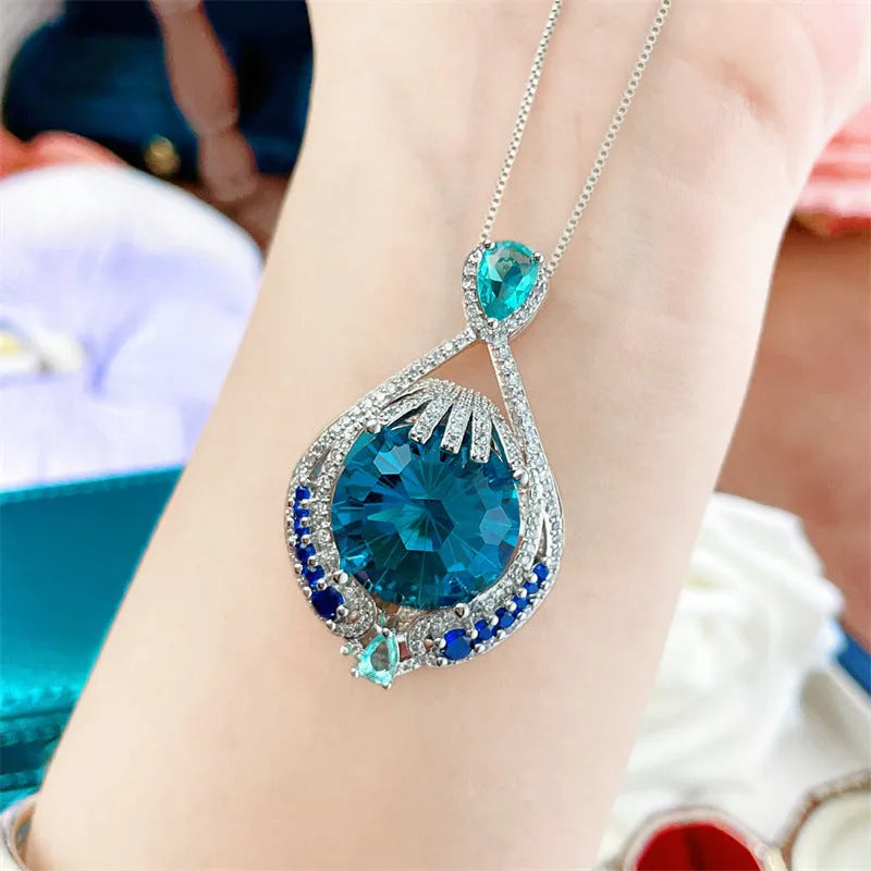 Blue geometric fireworks cut crystal pendant necklace on water wave chain
