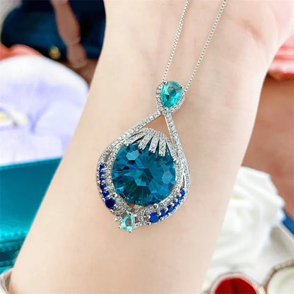 Blue geometric fireworks cut crystal pendant necklace on water wave chain