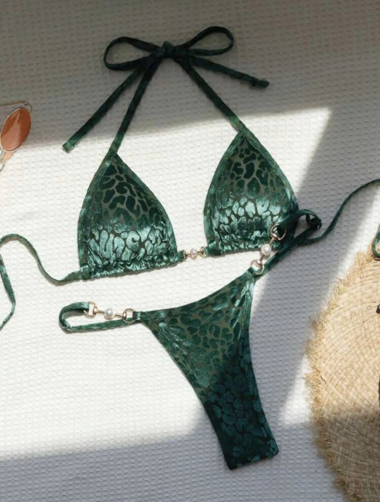 Women's leopard print bikini swimsuit set in various colours including blue and green, shown in triangle and skirt styles.