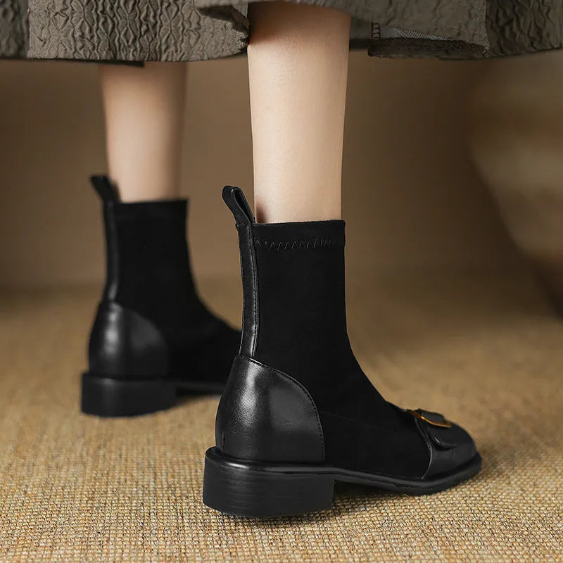Women's black casual martin boots with low heel, lace-up front, and belt buckle stitching detail