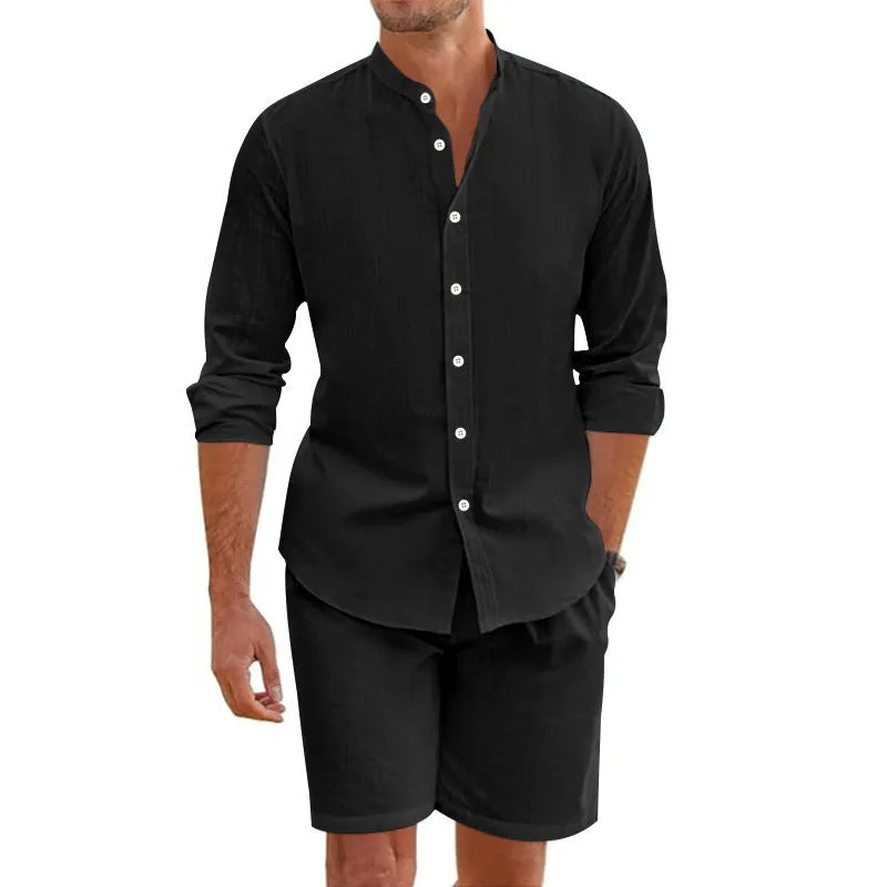 Man wearing a light blue short sleeve lapel shirt and matching drawstring shorts from a summer shirt suit.